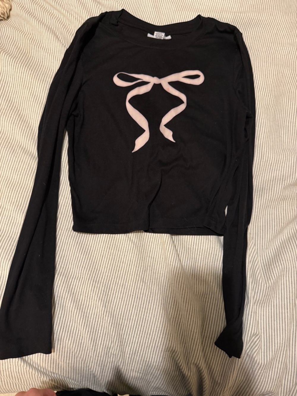 Black Long-Sleeve Kids Top with Pink Bow Graphic